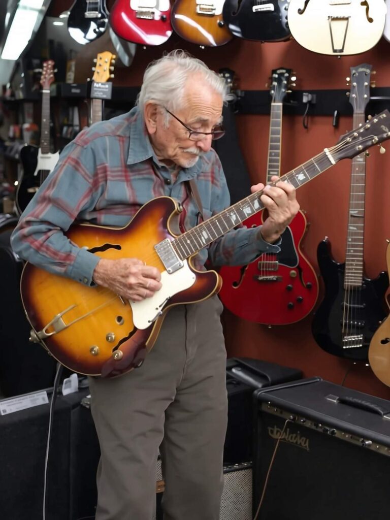 An 81-year-old grandpa walks into a guitar store, picks up one of the guitars, and starts playing to everyone’s amazement.