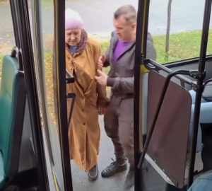 The old lady tried to get on the bus, but the passengers did not allow her. The bus driver taught a lesson to all the passengers