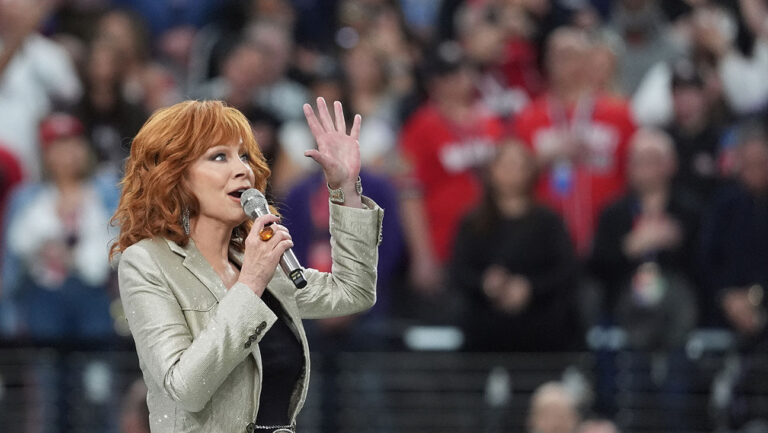 Tears flow as Reba McEntire sings the US National Anthem