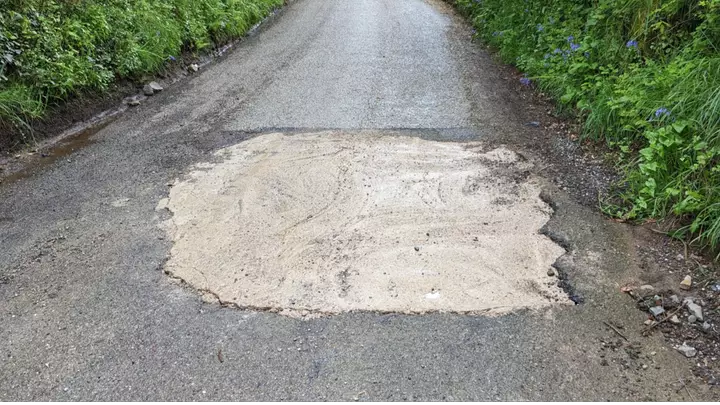 Motorist Takes Initiative to Fill Pothole, Incurs Private Company’s Wrath